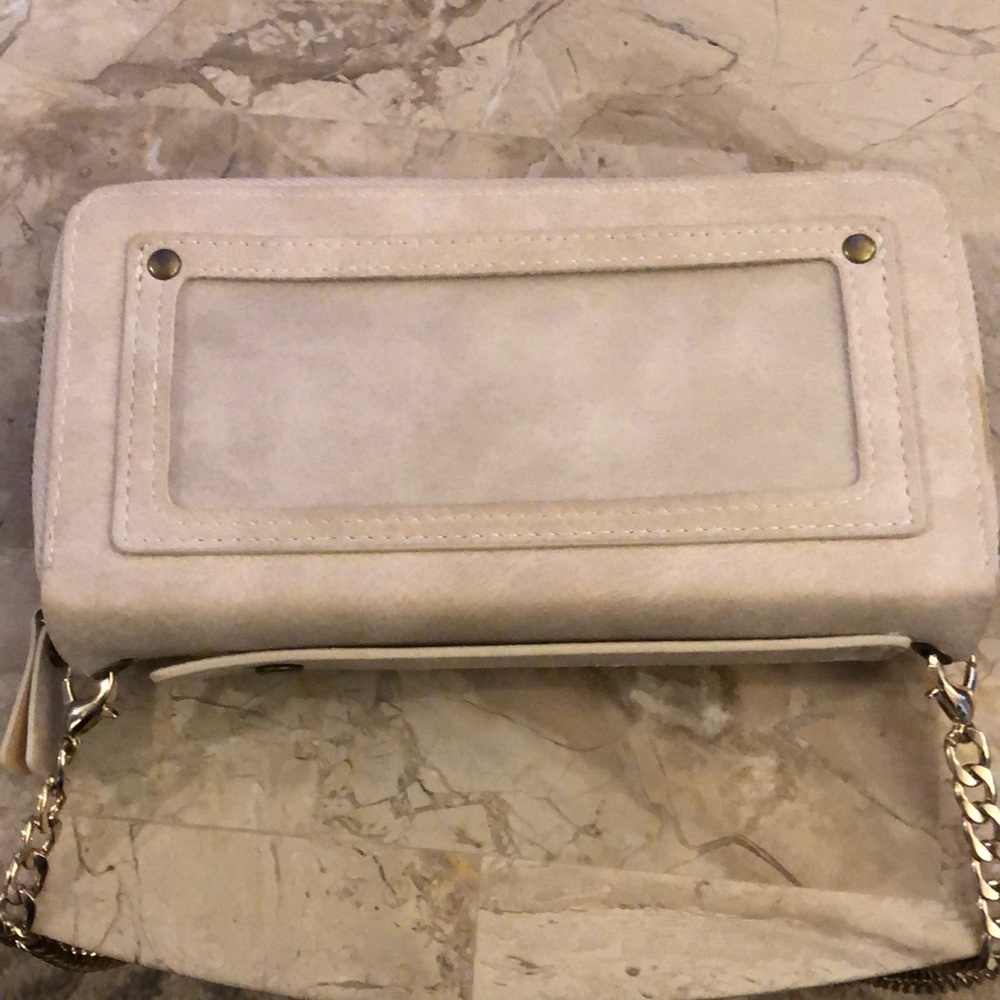 Crossbody bag/wallet with removable magnetic cell phone case
